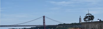 A Pair of Lovers Overlooking The Lisbon Suspension Bridge