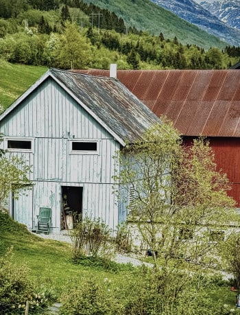 Two Rural Barns in the Upper Region of Norway and Mountains
