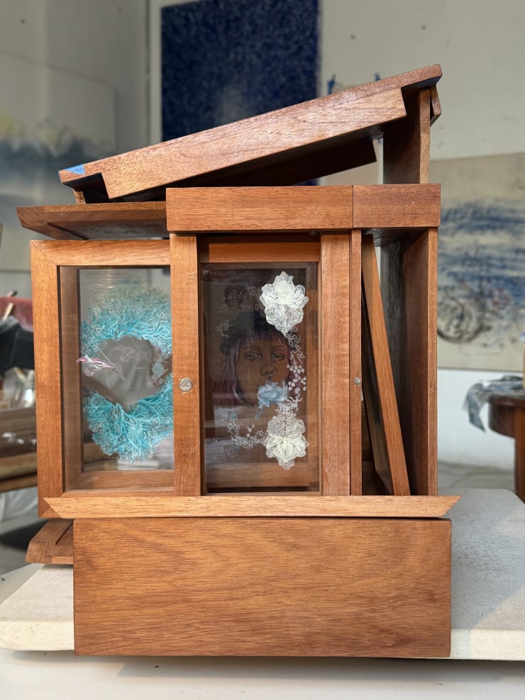 Modular box offering; a contemporary oracle where kinetic paintings link, revealing invisible truths through connection